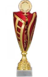 Pokal, metallisiert, goldfarben mit rot, geschnitten, auf hellem Marmorsockel